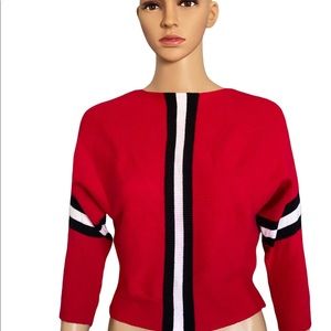 Pinklicious sweater, size S but will fit most.